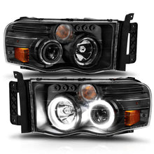 Load image into Gallery viewer, ANZO 2002-2005 Dodge Ram 1500 Projector Headlights w/ Halo Black Clear Amber - Installation View