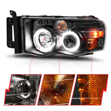 Load image into Gallery viewer, ANZO 2002-2005 Dodge Ram 1500 Projector Headlights w/ Halo Black Clear Amber - Additional View 7