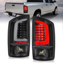 Load image into Gallery viewer, ANZO 2002-2006 Dodge  Ram 1500 LED Tail Lights w/ Light Bar Black Housing Clear Lens - Main Product View