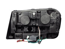 Load image into Gallery viewer, ANZO 2002-2009 Chevrolet Trailblazer Projector Headlights w/ Halo Black - Installation View
