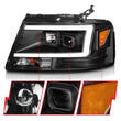 Load image into Gallery viewer, ANZO 2004-2008 Ford  F-150 Projector Headlights w/ Light Bar Black Housing - Back View