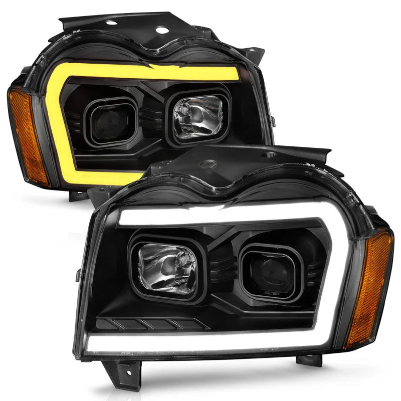 ANZO 2005-2007 Jeep Grand Cherokee Projector Headlights w/ Light Bar Switchback Black Housing - Installation View