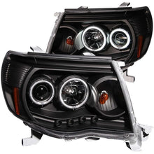Load image into Gallery viewer, ANZO 2005-2011 Toyota Tacoma Projector Headlights w/ Halo Black - Side View