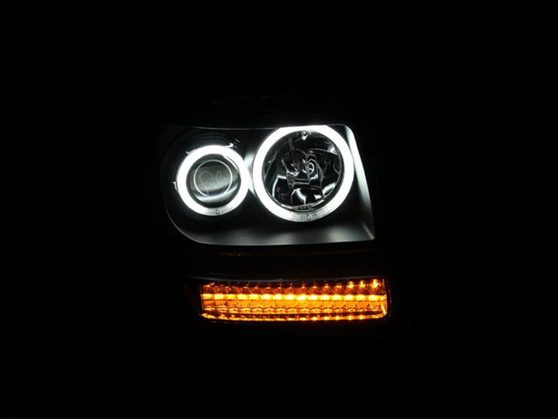 ANZO 2007-2012 Dodge Nitro Projector Headlights w/ Halo Black (CCFL) G2 - Side View