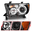 Load image into Gallery viewer, ANZO 2007-2013 Toyota Tundra Projector Headlights w/ Halo Black (CCFL) - Additional View 7