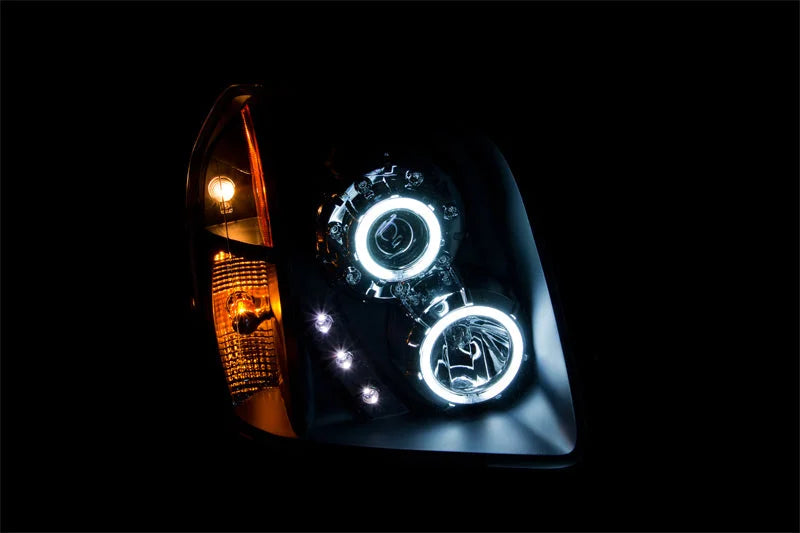 ANZO 2007-2014 Gmc Yukon Projector Headlights w/ Halo Black (CCFL) - Side View