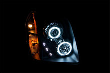 Load image into Gallery viewer, ANZO 2007-2014 Gmc Yukon Projector Headlights w/ Halo Black (CCFL) - Side View