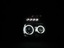 Load image into Gallery viewer, ANZO 2008-2010 Ford F-250 Projector Headlights w/ Halo Black (CCFL) - Installation View