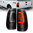 Load image into Gallery viewer, ANZO 2008-2016 Ford  F-250  LED Tail w/ Lights Bar Black Housing Smoke Lens - Main Product View