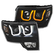 Load image into Gallery viewer, ANZO 2009-2014 Ford F-150 Projector Headlights w/ U-Bar Switchback Black w/ Amber - Back View