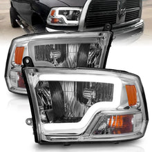 Load image into Gallery viewer, ANZO 2009-2018 Dodge Ram 1500/ 2500/ 3500 Crystal Headlights w/ Light Bar Chrome Housing - Main Product View