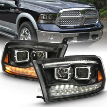 Load image into Gallery viewer, ANZO 2009-2018 Dodge Ram 1500 Projector H.L. Switchback Black Amber - Side View