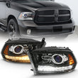 Load image into Gallery viewer, ANZO 2009-2018 Dodge Ram 1500 Projector Plank Style Switchback H.L Halo Black Amber (OE Style) - Main Product View