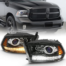 Load image into Gallery viewer, ANZO 2009-2018 Dodge Ram 1500 Projector Plank Style Switchback H.L Halo Black Amber (OE Style) - Main Product View