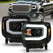Load image into Gallery viewer, ANZO 2014-2015 GMC Sierra 1500 Projector Headlights w/ Light Bar Black Housing (Halogen Type) - Main Product View