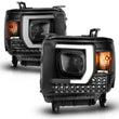 Load image into Gallery viewer, ANZO 2014-2015 Gmc Sierra 1500HD Projector Plank Style Headlight Black W/ Drl - Installation View