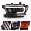 Load image into Gallery viewer, ANZO 2016-2017 Toyota Tacoma Projector Headlights w/ Plank Style Switchback Black w/ Amber - Back View