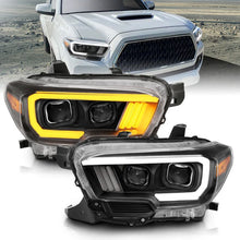Load image into Gallery viewer, ANZO 2016-2017 Toyota Tacoma Projector Headlights w/ Plank Style Switchback Black w/ Amber - Installation View
