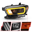 Load image into Gallery viewer, ANZO 2016-2017 Toyota Tacoma Projector Headlights w/ Plank Style Switchback Black w/ Amber w/ DRL - Installation View