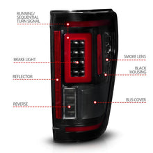 Load image into Gallery viewer, ANZO 21-23 Ford F-150 LED Taillights Seq. Signal w/BLIS Cover - Smoke Blk (For Factory Halogen ONLY) - Installation View