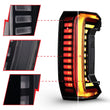 Load image into Gallery viewer, ANZO 22-24 Toyota Tundra Z-Series Full LED Tail Lights Smoke Lens Init/SeqSig- Pair - Installation View