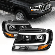 Load image into Gallery viewer, ANZO 99-04 Jeep Grand Cherokee Crystal Headlights - w/ Light Bar Black Housing - Main Product View