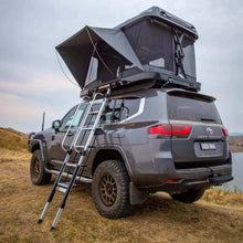 Load image into Gallery viewer, ARB Altitude Hard Shell Electric Rooftop Tent - Installation View