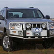Load image into Gallery viewer, ARB Combar Suit Oe Fog G/Cherokee Wk 05-08 Not 08-11 (Fit Kit NOT Included) - Side View