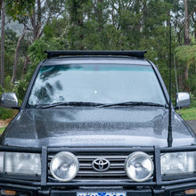 Load image into Gallery viewer, ARB Roof Rack Base with Mount Kit - Flat Rack with Wind Deflector - Side View
