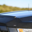 Load image into Gallery viewer, AVS Aeroskin Textured Low Profile Hood Shield - Black fits 2017-2018 Ford F-150 Raptor - Additional View 5