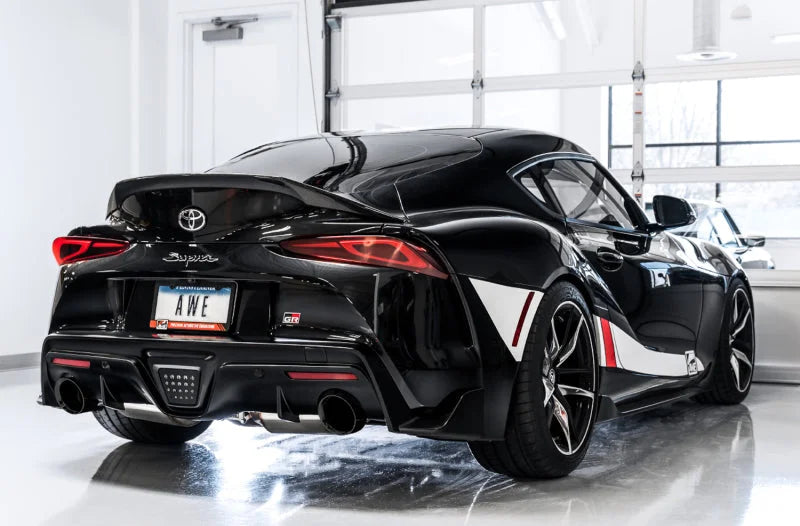 AWE 2020 Toyota Supra A90 Resonated Touring Edition Exhaust - 5in Chrome Silver Tips - Side View