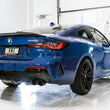 Load image into Gallery viewer, AWE Tuning 2019+ BMW M340i (G20) Non-Resonated Touring Edition Exhaust - Quad Diamond Black Tips - Installation View