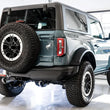 Load image into Gallery viewer, AWE Tuning 2021+ Ford Bronco 0FG Dual Rear Exit Exhaust w/Diamond Black Tips &amp; Bash Guard - Side View