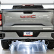 Load image into Gallery viewer, AWE Tuning 4th Gen GM 1500 5.3L 0FG Catback Split Rear Exit (Flat Bumper) - Quad Chrome Tips - Side View