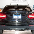 Load image into Gallery viewer, AWE Tuning BMW F22 M235i / M240i Touring Edition Axle-Back Exhaust - Chrome Silver Tips (90mm) - Side View