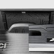 Load image into Gallery viewer, Access LOMAX Folding Hard Cover Full Size 5ft 8in Black Urethane (w/ CarbonPro) fits 19+ Chevrolet 1500 / GMC 1500 - Addit...