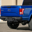 Load image into Gallery viewer, Addictive Desert Designs 15-18 Ford F-150 Stealth Fighter Rear Bumper w/ Backup Sensor Cutout - Main Product View