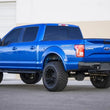 Load image into Gallery viewer, Addictive Desert Designs 15-18 Ford F-150 Stealth Fighter Rear Bumper w/ Backup Sensor Cutout - Side View