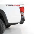Load image into Gallery viewer, Addictive Desert Designs 16-19 Toyota Tacoma Stealth Fighter Rear Bumper w/ Backup Sensor Cutouts - Side View
