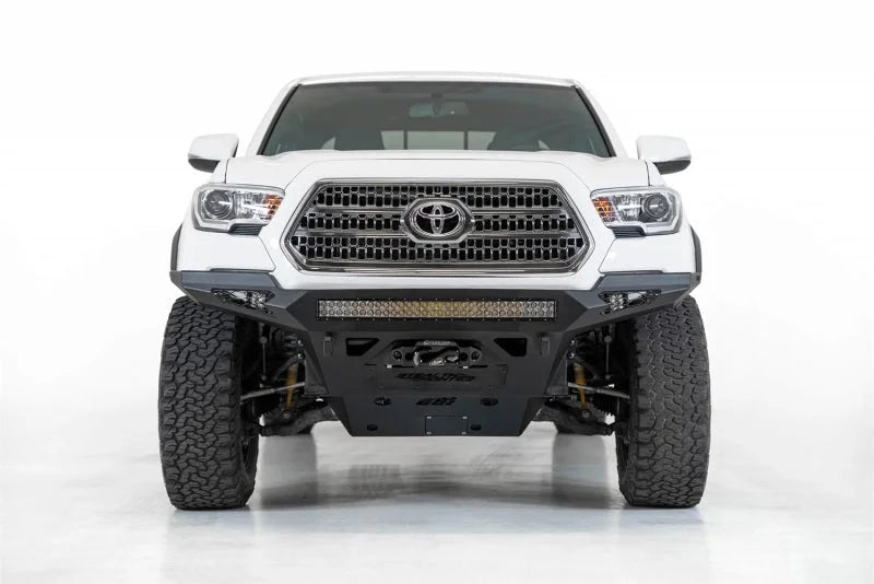 Addictive Desert Designs 16-19 Toyota Tacoma Stealth Fighther Front Bumper w/ Winch Mount - Side View