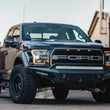 Load image into Gallery viewer, Addictive Desert Designs 17-18 Ford F-150 Raptor HoneyBadger Front Bumper - Main Product View