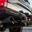 Load image into Gallery viewer, Addictive Desert Designs 17-18 Ford F-150 Raptor HoneyBadger Rear Bumper w/ 10in SR LED Mounts - Back View