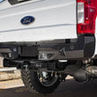 Load image into Gallery viewer, Addictive Desert Designs 17-18 Ford F-250 Raptor Stealth Fighter Rear Bumper w/ Backup Sensor Cutout - Main Product View