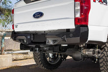Load image into Gallery viewer, Addictive Desert Designs 17-18 Ford F-250 Raptor Stealth Fighter Rear Bumper w/ Backup Sensor Cutout - Main Product View