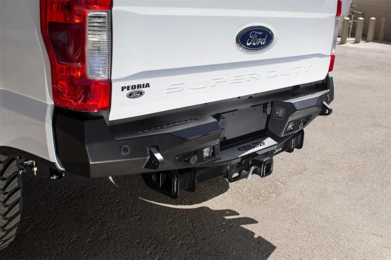Addictive Desert Designs 17-18 Ford F-250 Raptor Stealth Fighter Rear Bumper w/ Backup Sensor Cutout - Installation View
