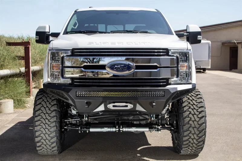 Addictive Desert Designs 17-18 Ford F-250 Super Duty Stealth Fighter Front Bumper w/ Winch Mounts - Side View