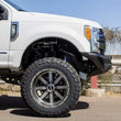 Load image into Gallery viewer, Addictive Desert Designs 17-18 Ford F-250 Super Duty Stealth Fighter Front Bumper w/ Winch Mounts - Back View