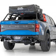 Load image into Gallery viewer, Addictive Desert Designs 17-20 Ford Raptor F-150 Bomber Rear Bumper w/ Backup Sensor Cutouts - Back View
