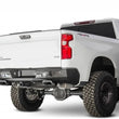 Load image into Gallery viewer, Addictive Desert Designs 19-20 GM 1500 Stealth Fighter Rr Bumper w/ Backup Sensor Cutouts - Side View
