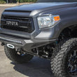 Load image into Gallery viewer, Addictive Desert Designs 2014+ Toyota Tundra Stealth Fighter Front Bumper w/Winch Mount &amp; Sensors - Installation View